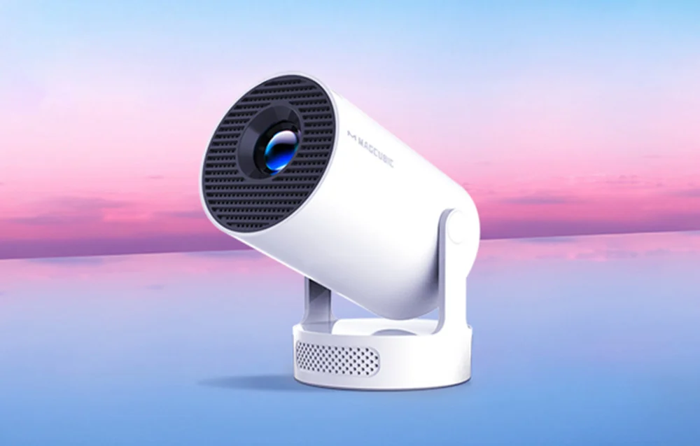 A white, cylindrical projector pointing upward against a pink-and-purple sunset sky