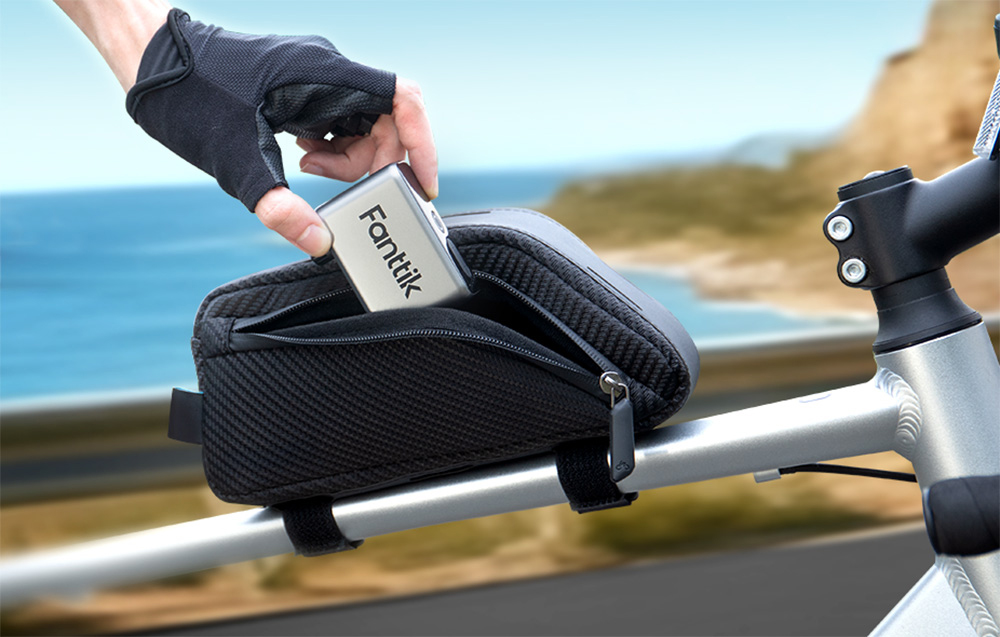Fanttik mini bike pump placed in a bike bag
