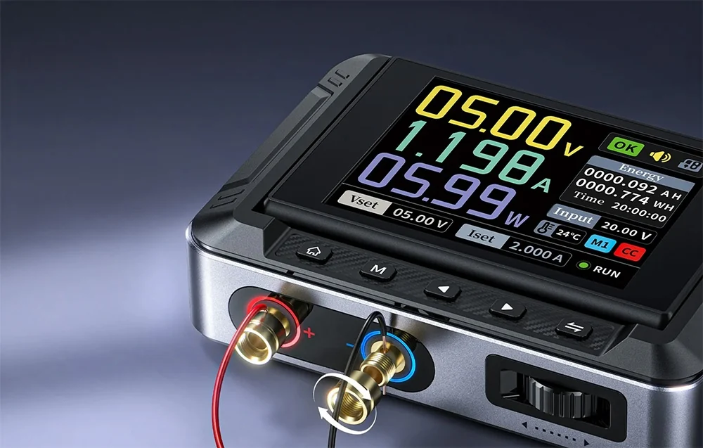 A close-up of the power supply’s front panel with the screen, banana jacks (red and blue), and a connected black wire.