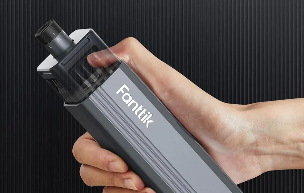 A hand-held electric screwdriver in a Fanttik case.