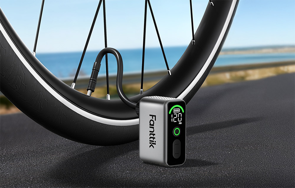 Fanttik mini bike pump inflating a bike tire