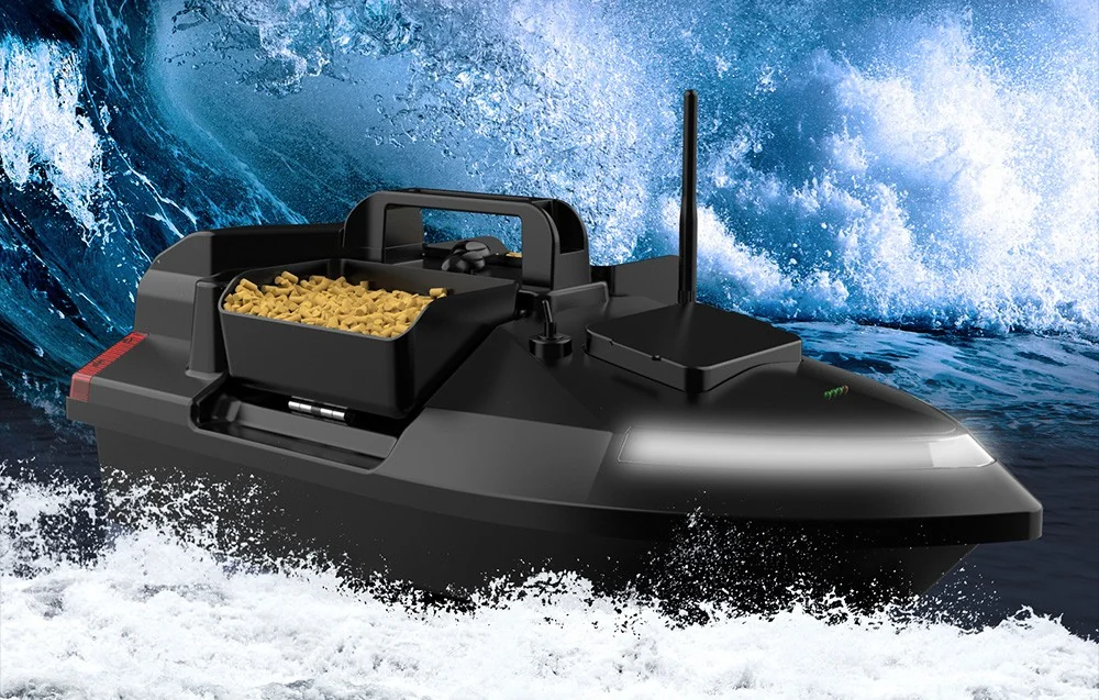 Black RC bait boat with pellets in the container on the background of the big wave, white LED light on the bow