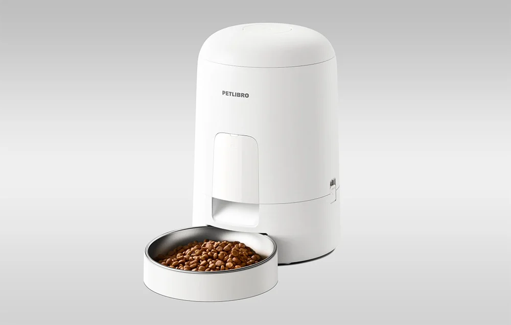 White Petlibro smart pet feeder on a gray background