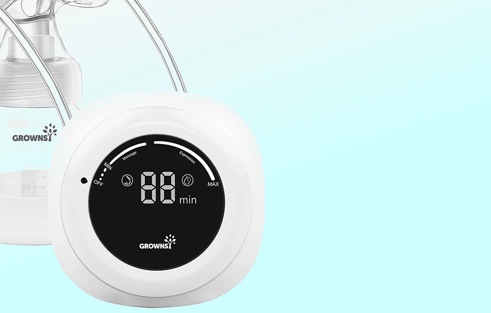 Close-up of the round control panel of the breast pump with a display showing the operating time in minutes