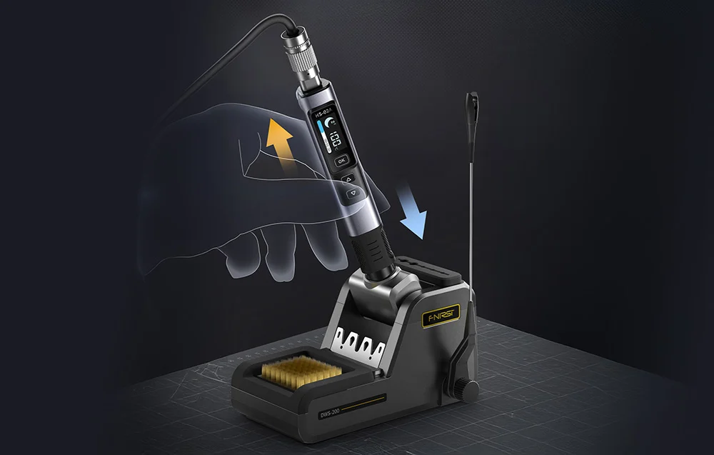 FNIRSI soldering iron placed in a docking station with a tip cleaning sponge.