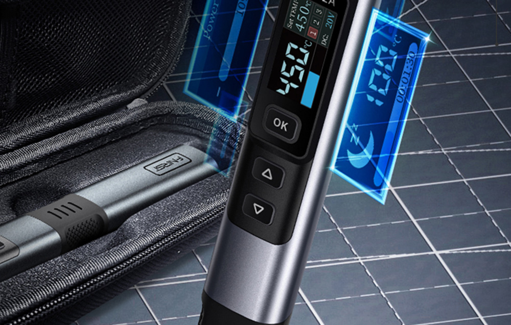 FNIRSI soldering iron with a digital display next to its carrying case.