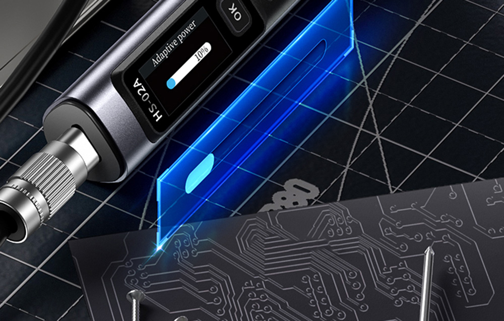 The FNIRSI soldering iron with a display showing the Adaptive Power function.