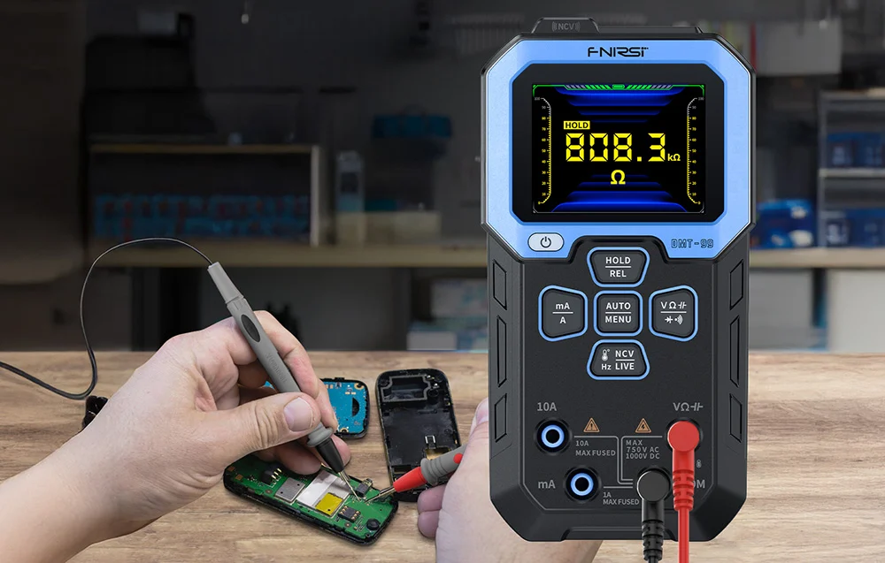 Service technician repairing a smartphone with a multimeter displaying resistance measurement in the background at the workstation