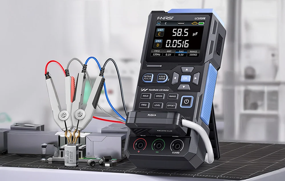 Handheld meter standing on a table on a black mat
